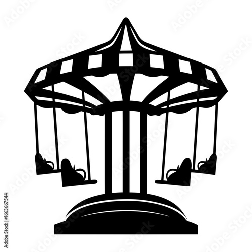 Silhouette of a classic swing ride at a fair or carnival