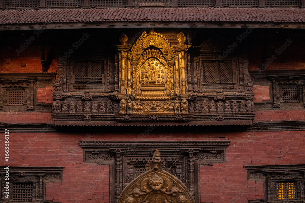 Fototapeta premium Exploring Patan Durbar Square at Night and Day – A Journey Through Ancient Newar Architecture in Nepal