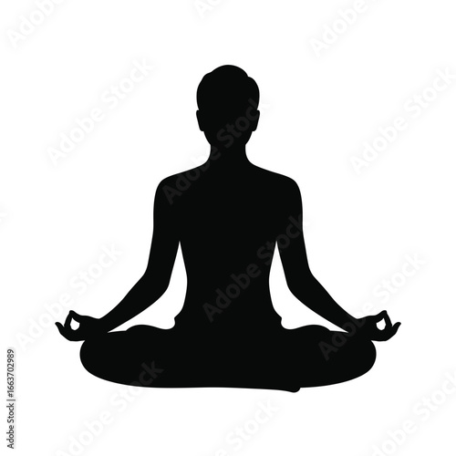 Silhouette of a person meditating in a lotus pose