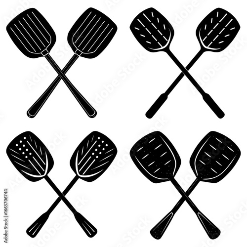 Four crossed black and white spatula pairs with varying slot designs on a white background surface view