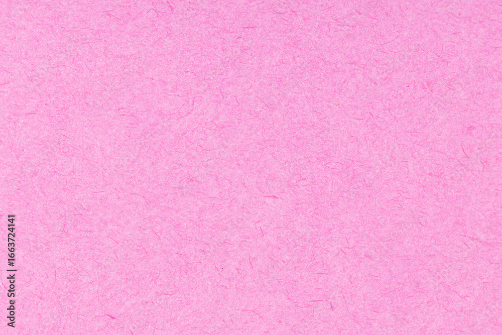 Fototapeta premium Pink textured paper background. Full frame