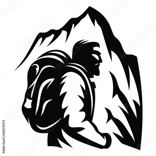 Silhouette of a determined hiker with a backpack against a mountain backdrop