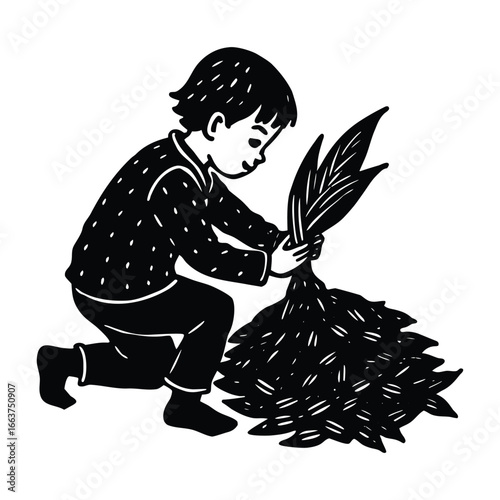 Child gathering a bundle of harvested crops in a field