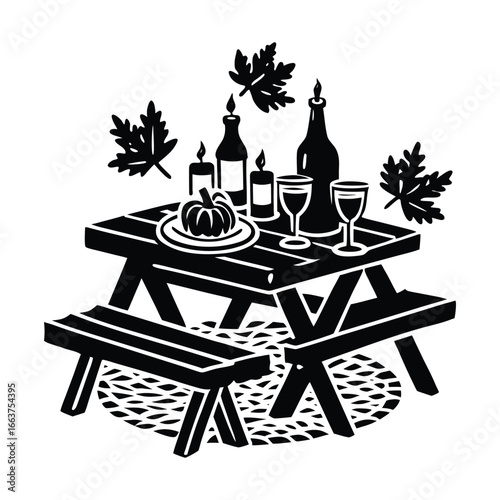Autumn picnic table with pumpkin wine and candles