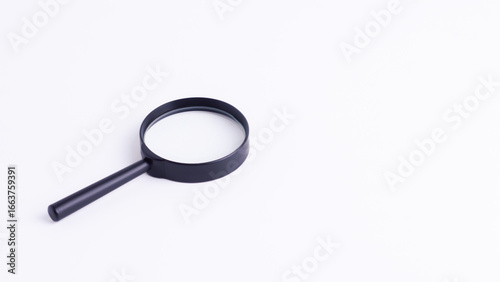 Wallpaper Mural Magnifying glass isolated on white background with copy space, representing search, investigation, research, discovery, zoom, analysis, and problem-solving concepts.
 Torontodigital.ca