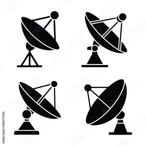 Four satellite dish antennas for communication and broadcasting