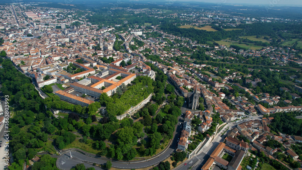 Fototapeta premium Aerial panorama view around the old town and around the city Angoulême in France, on a sunny summer noon