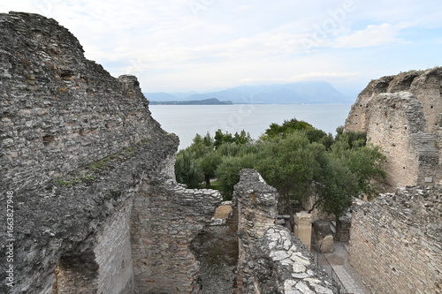 Ruins In The Grottoes Of Catullus At Lake Garda In Sirmione Italy On A Wonderful Sunny Autumn Day With A Few Clouds In The Sky