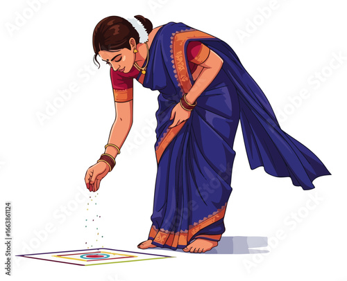 Indian woman in traditional sari making a colorful Rangoli