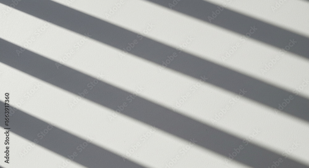 Obraz premium Abstract Light and Shadow on White Wall