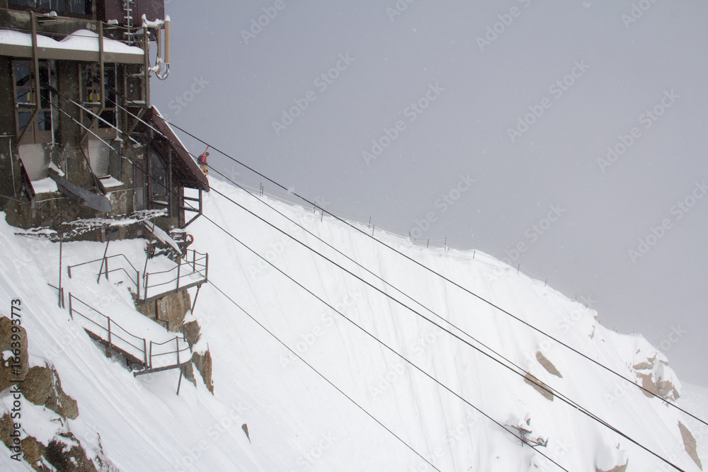 Obraz premium Aiguille du Midi in snowy weather Chamonix Haute-Savoie France