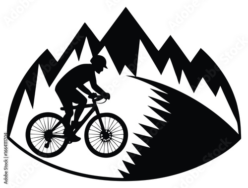 Mountain biker silhouette on a trail through the mountains for extreme sports