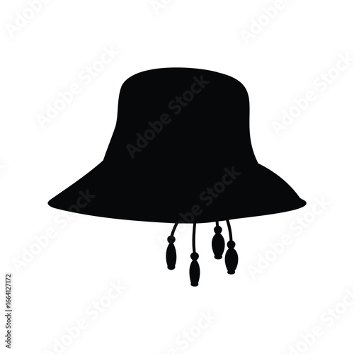 Silhouette of a vintage hat with decorative tassels in black and white
