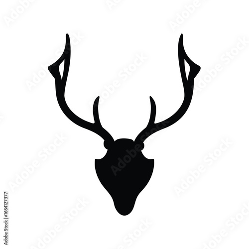 Silhouette of deer antlers and head, mounted as a trophy for display