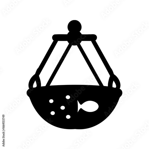 Black silhouette of hanging fish bowl aquarium icon - A black silhouette of a hanging fish bowl with a fish inside, representing home decor, pets, aquariums, and aquatic lifestyle themes.
