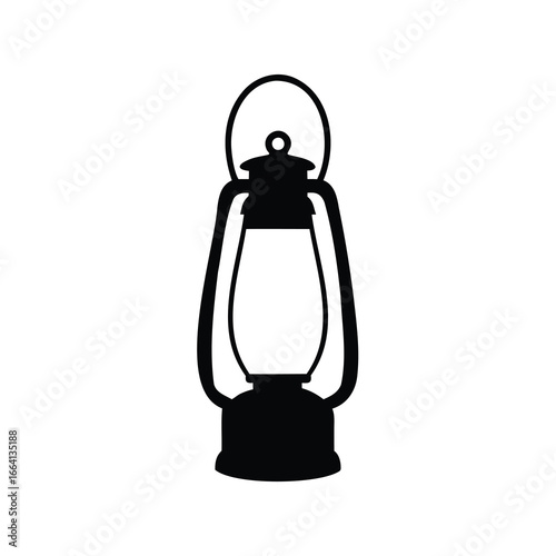 Silhouette of a vintage kerosene lantern, traditional light source for camping