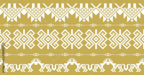 Traditional pixel art ethnic pattern in white on a mustard yellow background. Geometric, symmetrical motifs perfect for textile design, embroidery, wallpapers, or cultural crafts.