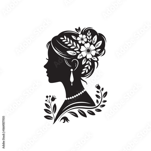 Elegant silhouette of a woman in profile with elaborate hairstyle and floral accents silhouette