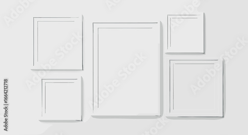 Minimalist white picture frames on a neutral wall background
