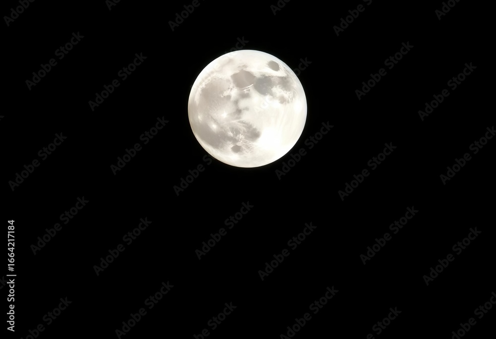 Obraz premium Full moon, stark black backdrop, celestial body, lunar surface details visible, serene, cosmos