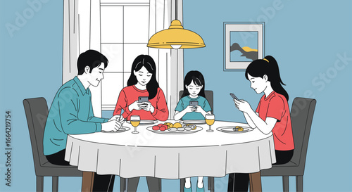 Modern family disconnects at dinner table staring at phones instead of each other