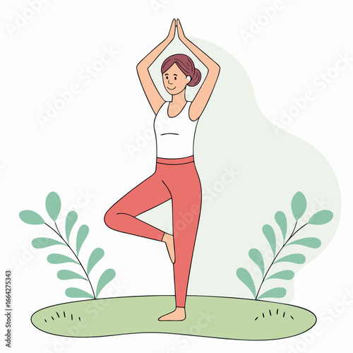 Woman in tree pose yoga on green mat with plants vrikshasana female