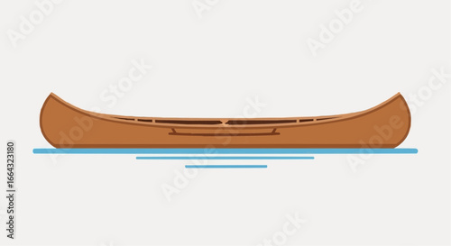 A classic wooden canoe floats serenely on calm water.