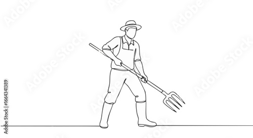 A farmer working in the field with a pitchfork. 