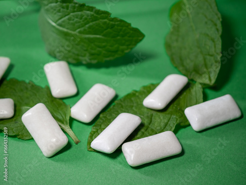 Photography Chewing gums in the form of dragees for freshening breath, mint flavored gum, me