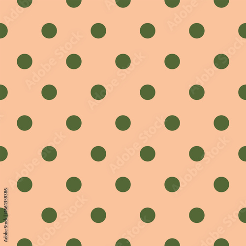 A seamless vector pattern featuring forest green polka dots on a soft peach background. Perfect for eco-style packaging and home decor.