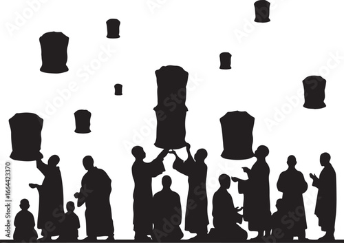 Silhouette of people releasing sky lanterns at night celebration festival