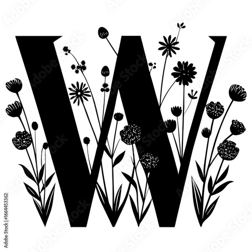 Elegant Floral Letter W Design in Black and White Silhouette