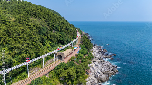 Wallpaper Mural Busan, South Korea Colorful Sky Capsule train, a landmark seaside railway route, a destination where tourists take a train by the sea. Sky Capsule Haeundae August 2, 2025 Torontodigital.ca