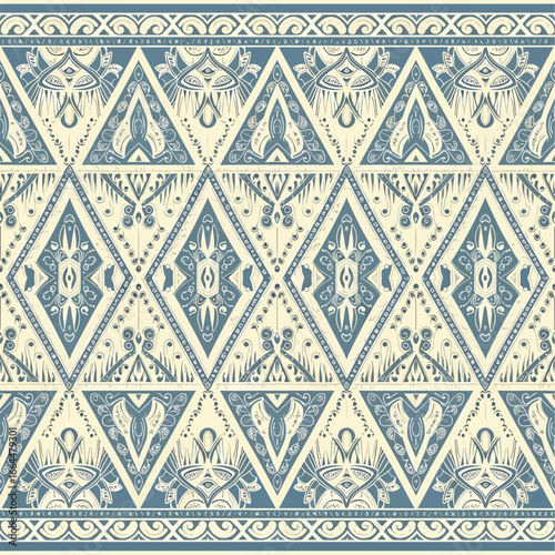Seamless Pattern, Ornate pattern with blue and cream hues featuring diamond and triangle shapes Stock royalty free
