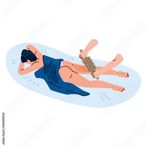 Masseuse using wooden roller doing anti cellulite massage on woman's leg