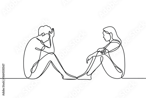 Couple sitting apart in a moment of sadness and disconnection