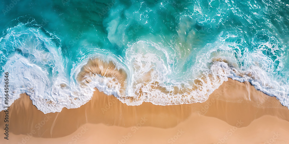 Fototapeta premium Aerial view of waves crashing on sandy beach 