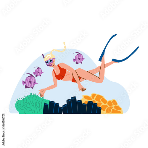 Young woman snorkeling exploring underwater marine life