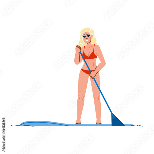 Smiling blond woman paddle boarding in ocean on summer vacation
