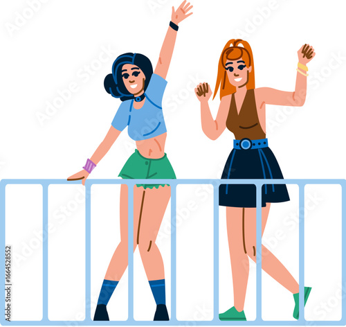 Young women dancing and having fun at music festival