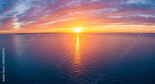 Golden Hour Embrace: Ocean Sunset Panorama
