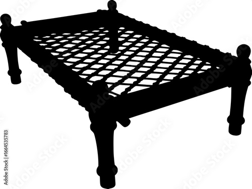 A black silhouette of a handwoven cot (charpai) with four sturdy posts and a tight criss-cross netting across the frame. The perspective is slightly elevated, angled bottom-right view, clean white bac