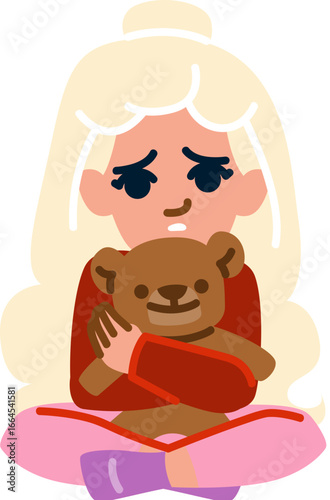Sad child hugging teddy bear while sitting on floor