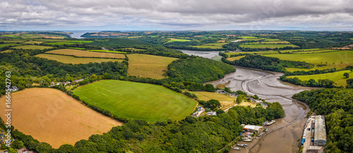 Quadro su tela Aerial view of Gweek village with surrounding green fields and countryside