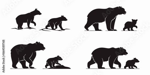 Silhouette of Mother Bear and Cub Walking Together