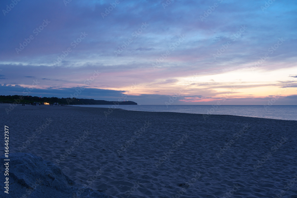 Fototapeta premium Władysławowo, Pomerania, Poland - 26 June 2025: Cape Rozewie seen from sandy beach in Władysławowo in the evening