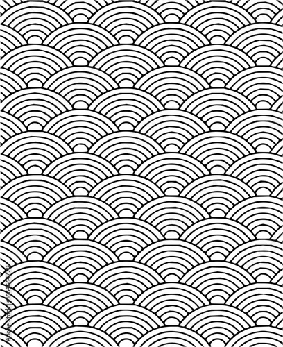Black and white seamless pattern of overlapping semicircles creating a wave like design for backgrounds
