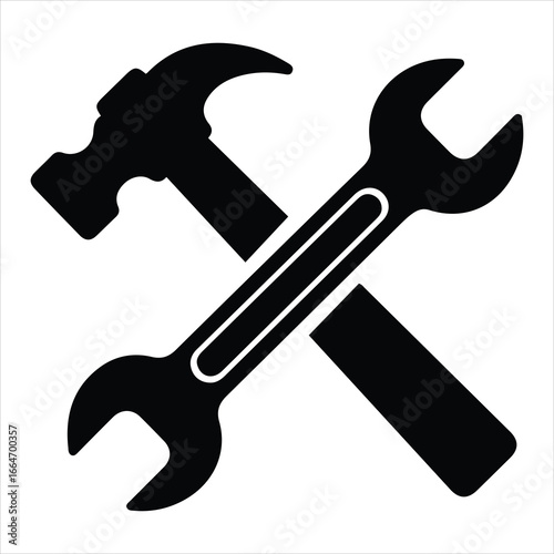 Iconic crossed hammer and wrench symbol representing repair maintenance construction and tools