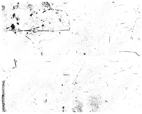 A high contrast image displays a white surface heavily marked with black spots, scratches, and various distressed effects, suggesting age and wear. The overall texture is rough.
