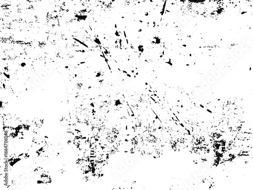 A high contrast, black and white image presenting a distressed pattern. Rough textures, splatters, and imperfections create an aged or grunge appearance on the surface.